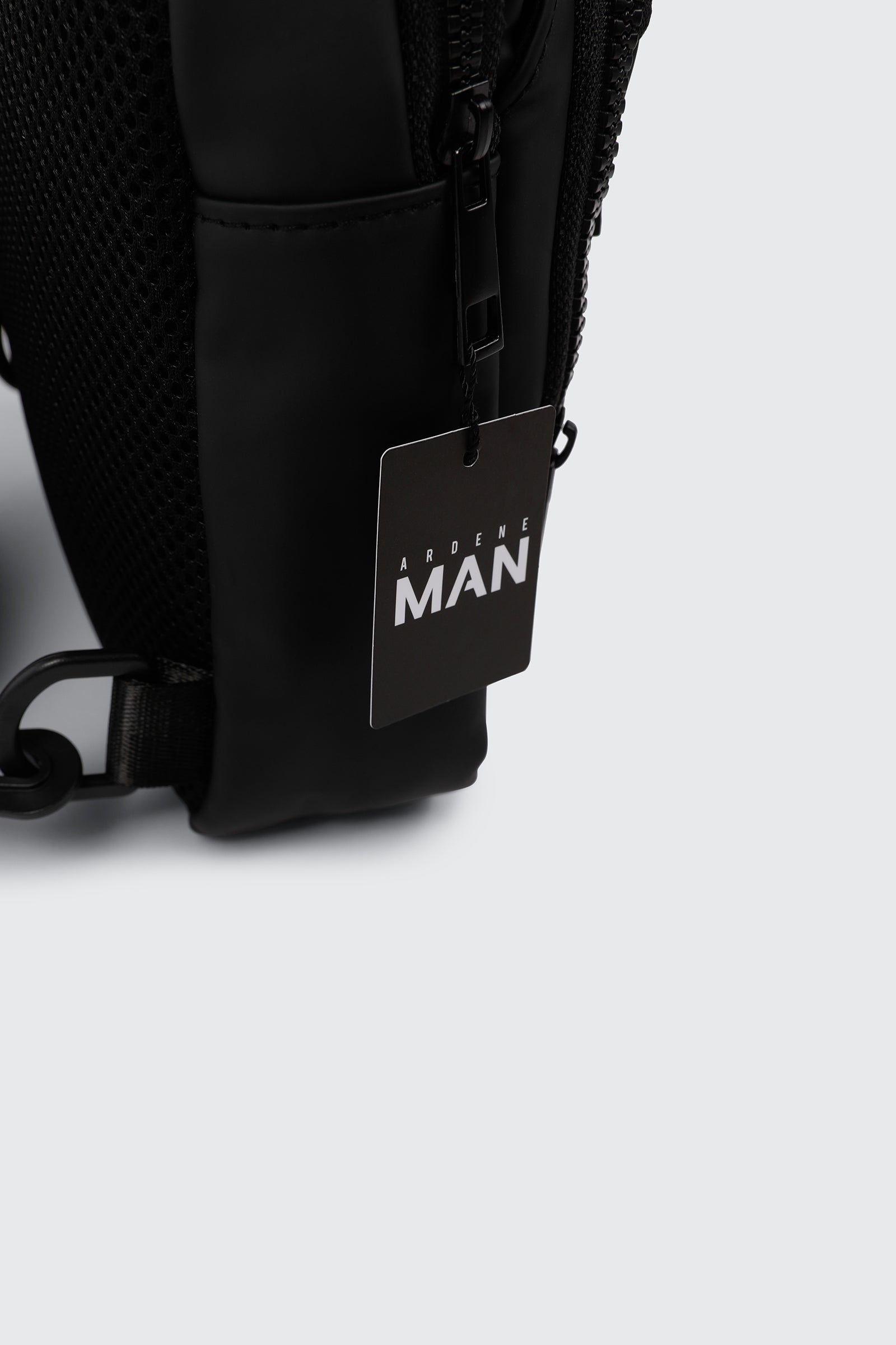 Rubberized Sling Backpack